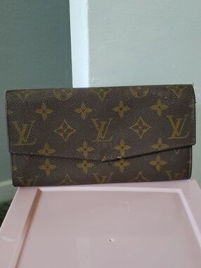 Louis Vuitton Monogram Flap Continental Wallet in Brown